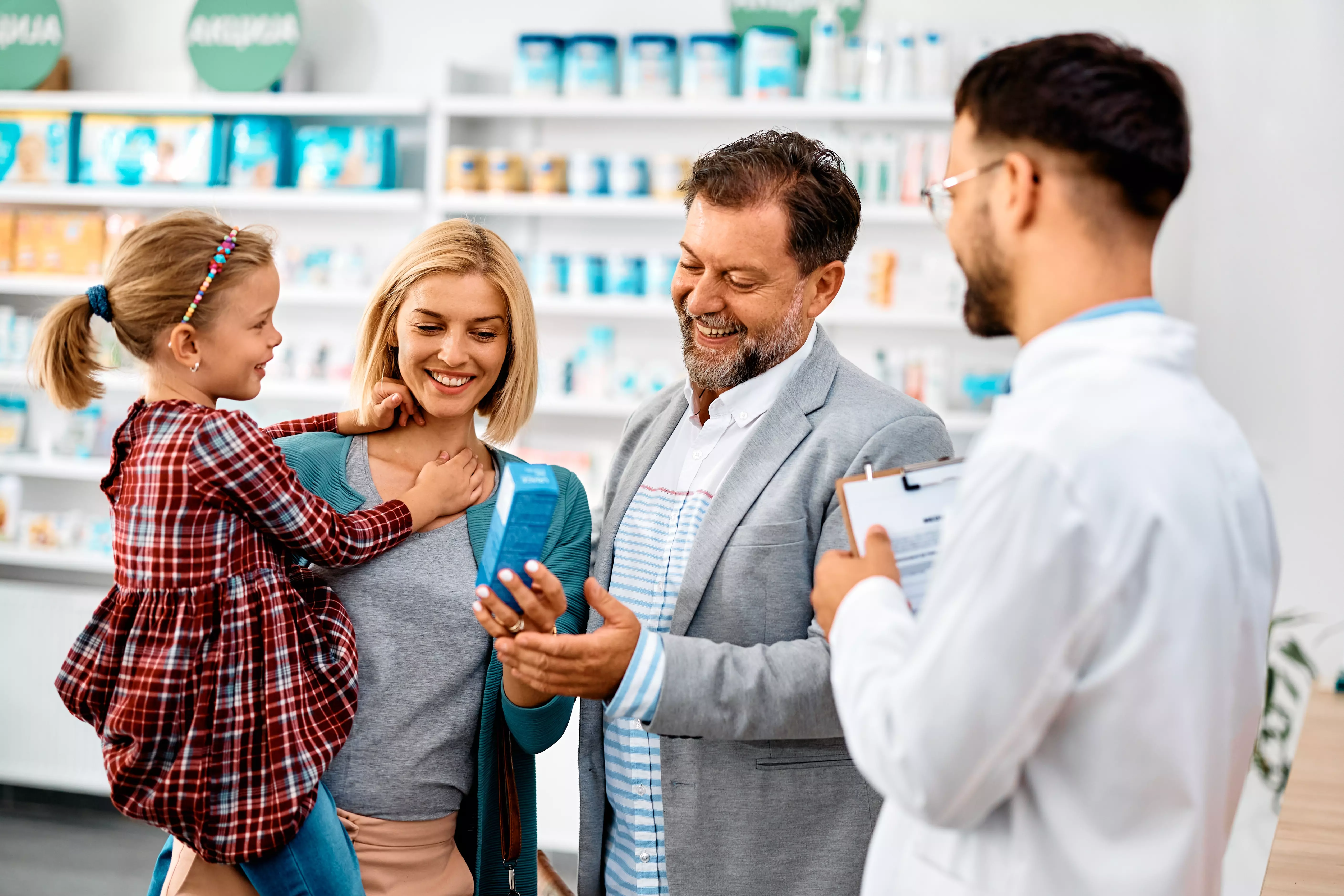 Pharmacist helping family